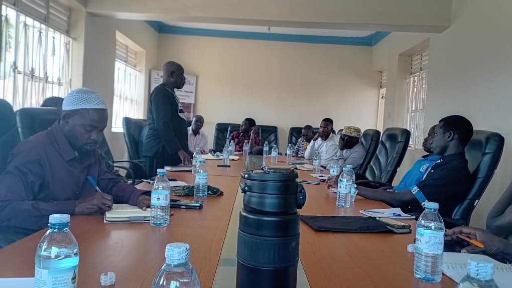 RACI and partner representatives seated with religious and community leaders during the inter-religious dialogue in Yumbe Town